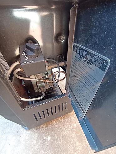 plafonski ventilatori za terase: Peć na gas sa slike, za prostorije do 20 kvadrata, dimenzije 70 cm x — 2