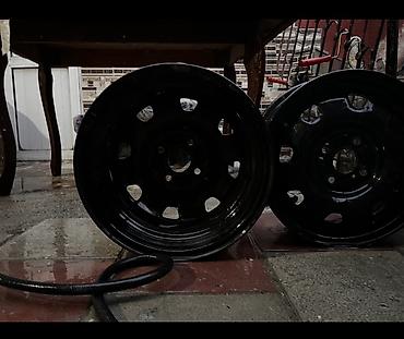 Disklər: Məhsul: 4 ədəd polad disk (qara rəng) Təsvir: - Universal polad təkər — 3