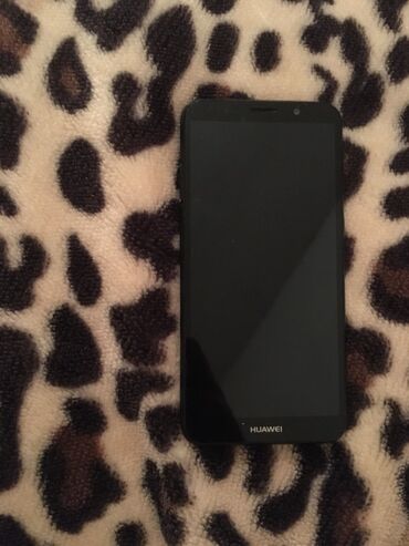huawe: Huawei Y5, 16 ГБ, цвет - Черный, Отпечаток пальца