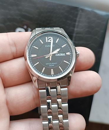 5 15: Casio kişi qol saatı - Model: MTP seriyası (arxa qapaqda MTP-1383 — 1