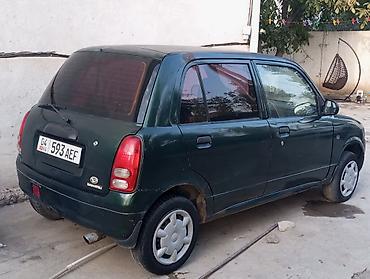 дордой мото: Daihatsu Cuore: 2002 г., 1 л, Кол менен иштөөчү, Бензин, Хетчбек — 1