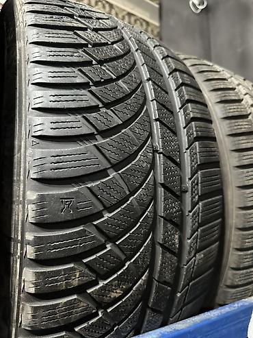 ki 5: Зимние шины 255/40 R19 - Размер: 255/40 R19 (указан на стеллаже) - — 2