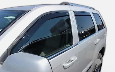 Spojleri: BOCNI VETROBRANI DEFLEKTORI JEEP GRAND CHEROKEE WK 0 | NOVI Bocni — 2