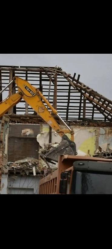 Демонтаж и вывоз строительного мусора экскаватором - Механизированный