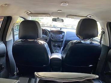Продажа авто: Ford Focus: 2015 г., 1.6 л, Механика, Бензин, Универсал — 6