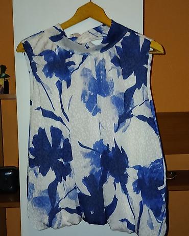 Donji deo: Ženske trenerke i haljina – set različitih komada 1) Crne sportske — 9