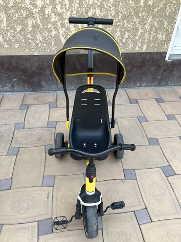 Другие товары для детей: Детский велосипед черно-желтого цвета б/у
