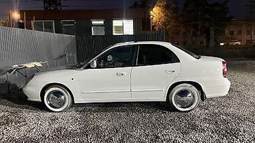 предлогайте варианты: Daewoo Nubira: 2000 г., 1.5 л, Механика, Бензин, Седан — 5