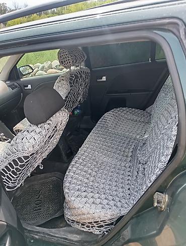 допл: Ford Mondeo: 2003 г., 1.8 л, Механика, Газ, Универсал — 1