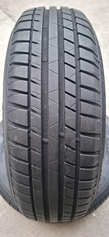 tomos puch: Prodajem 2kom polovne letnje auto gume dimenzije 185 65 R15 Riken — 2