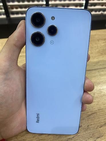 ксяоми 17: Смартфон Redmi 12, голубой цвет корпуса. Ключевые характеристики: - — 1