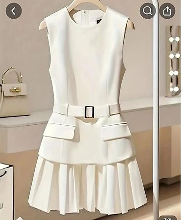 mini çanta: Təzədir Ağ rəngli, dizdən yuxarı uzunluqda zərif qadın donu. – Model — 2