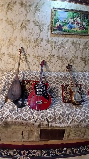 gitara: Azərbaycan xalq musiqi alətləri və elektrik gitara dəsti Tərkib: - — 1