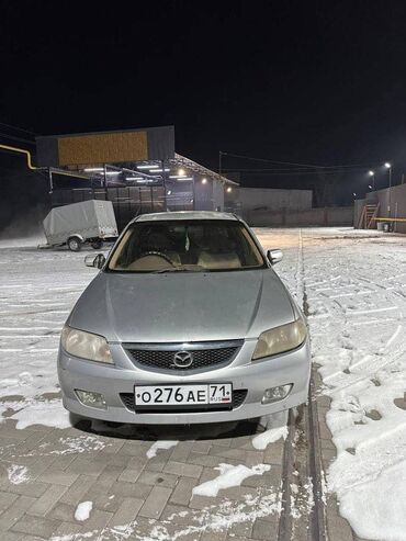 Mazda: Mazda Familia: 2003 г., 1.5 л, Автомат, Бензин, Седан