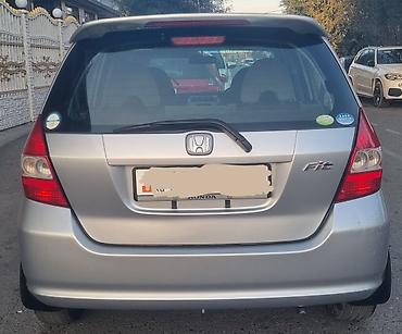 Honda: Honda Fit: 2002 г., 1.3 л, Вариатор, Бензин, Седан — 2
