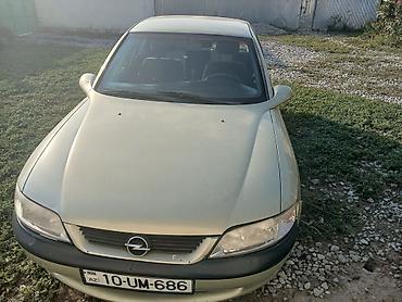 masin satisi: Opel Vectra B sedan - Korpus: 4 qapılı sedan, açıq yaşıl rəng - Ban — 4
