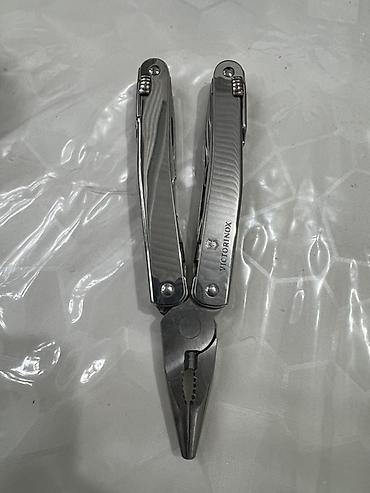 Инструменттер: Мультитул Victorinox (серия SwissTool/Spirit) с кожаным чехлом и — 3