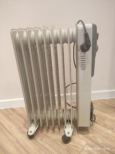 Elektronika: Yağ radiatoru – Sinbo markası, 9 bölməli Xüsusiyyətlər: - Mexaniki — 2