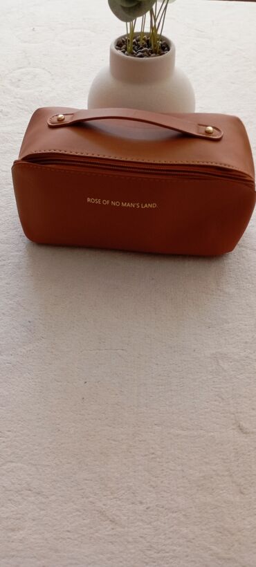 Cosmetic bags: Color - Brown