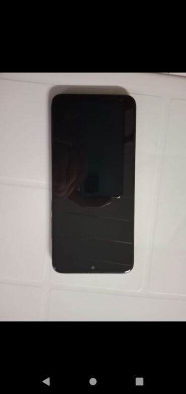 alcatel shine: Normal vezyetdedir usdada olmayb kabrosunda ciziglar var