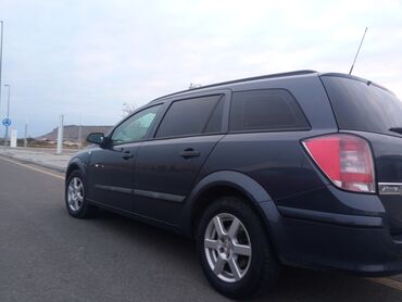 Opel: Opel Astra H – 5 qapılı hetçbek Xüsusiyyətlər: - Kuzov: tünd göy — 14