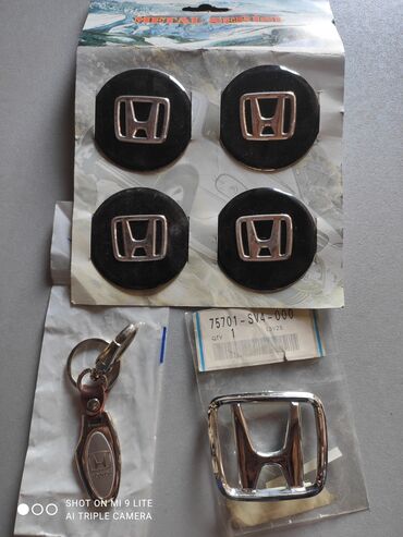 шкатулки для ключей: Накладки (наклейки) на колпачки дисков колес (диаметр 60мм), знак и
