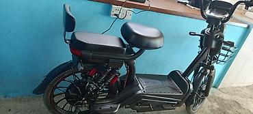 velisoped: Elektrik moped/skuter - Şassi və dizayn: Qara rəngli, yığcam gövdə; — 2