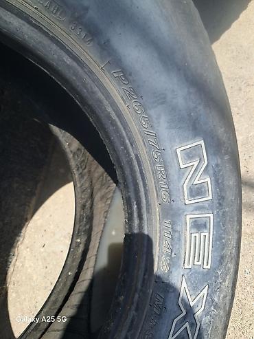 bud e9: Шины 265 / 75 / R 16, Всесезонная, Б/у, Комплект, Внедорожные (АТ/МТ), Nexen — 1