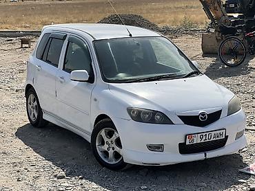 Mazda Demio: 2003 г., 1.5 л, Автомат, Бензин, Хэтчбэк