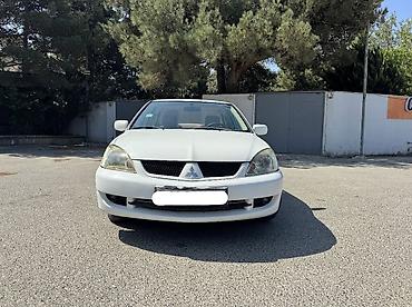 misin: Mitsubishi Lancer: 1.6 l | 2007 il 313000 km Sedan — 2
