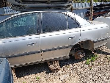 другой: Opel Omega B, серебристый седан — разбор по запчастям Доступны — 1