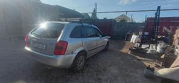 мазла: Mazda Familia: 1999 г., Бензин, Универсал — 3