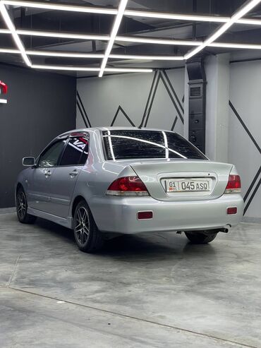 шины на к5: Mitsubishi Lancer: 2004 г., 1.6 л, Механика, Седан