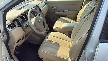 bort baqaj: Nissan Tiida hatchback – gümüşü rəng Xüsusiyyətlər və təchizat: - — 7