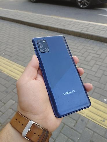 galaxy tab e: Samsung Galaxy A31, 64 GB, rəng - Qara, Zəmanət, Simsiz şarj, İki sim kartlı — 1