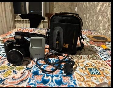 tsifrovoi fotoapparat canon powershot sx410 is black: Kanon fotoaparat satılır. Yeni kimidir. 32 lik yaddas kartı ve çantası