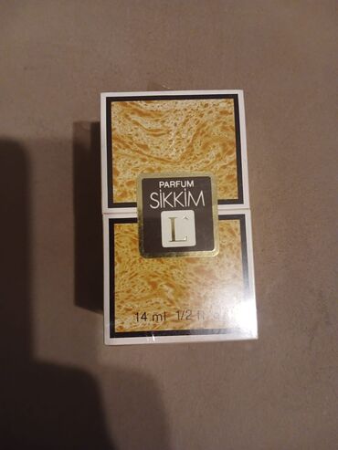 Свадебные платья и аксессуары: Məhsul: Parfum Sikkim L - Növ: Parfum (ətir) - Həcmi: 14 ml (1/2 fl