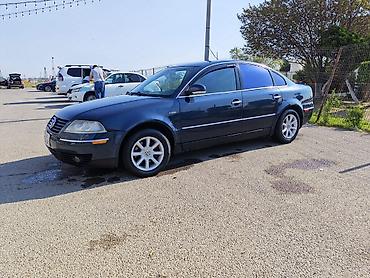 changan disk: Volkswagen Passat sedan. Avtomobil tünd göy rəngdədir və klassik — 5