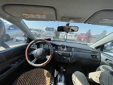сузуки лиано: Mitsubishi Lancer: 2004 г., Автомат, Бензин, Седан — 4