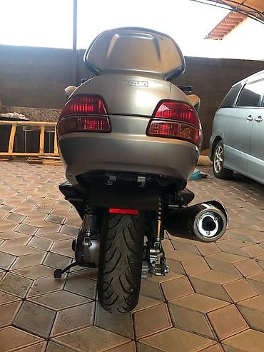 Suzuki: Suzuki Skywave 650 (Burgman) – крупный туристический максискутер — 4