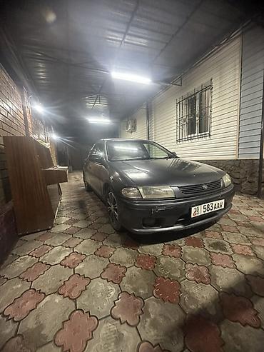 фамиля: Mazda Familia: 1997 г., 1.6 л, Автомат, Бензин, Седан — 2