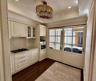 Продажа квартир: 3 комнаты, 98 м², Элитка, 9 этаж, Дизайнерский ремонт — 15