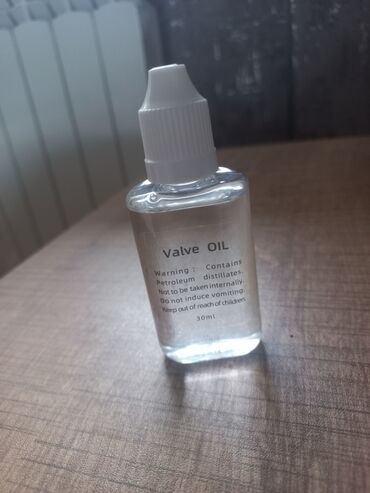 muherik: Truba ucun klapan yağı, 30 ml həcmində şəffaf butulkada