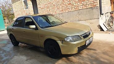 шит приборы: Mazda 323: 1998 г., 1.6 л, Механика, Бензин, Седан — 3