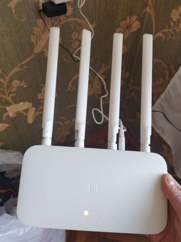 xiaomi modem: Xiaomi Mi Router 4A - İki diapazonlu Wi‑Fi: 2.4 GHz və 5 GHz dəstəyi