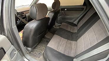 серый gac aion s: Daewoo Gentra: 2014 г., Механика, Газ, Седан — 4