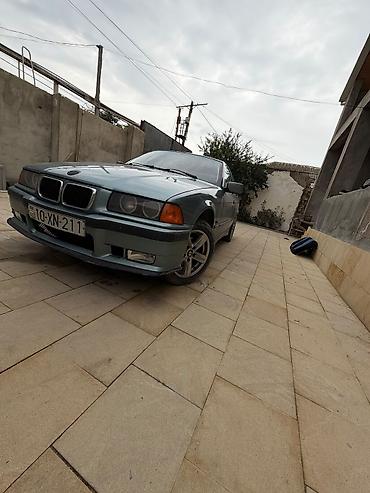 5 karopka: BMW 3 series: 1.6 l | 1994 il Sedan — 2