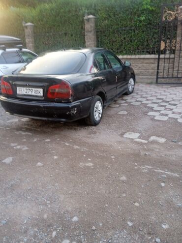 линзы для камеры: Mitsubishi Carisma: 1998 г., 1.6 л, Механика, Бензин, Хэтчбэк