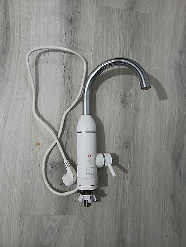 Бытовая техника: Проточный водонагреватель‑смеситель Atmor с изливом - Электрический — 1