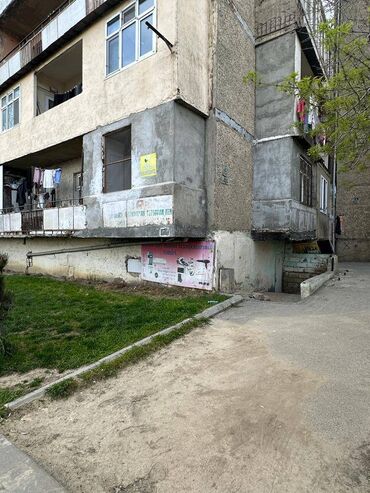 Kommersiya daşınmaz əmlakının satışı: Köhnə Günəşlidə əsas yolun kənarında, 9 mərtəbəli binanın — 2